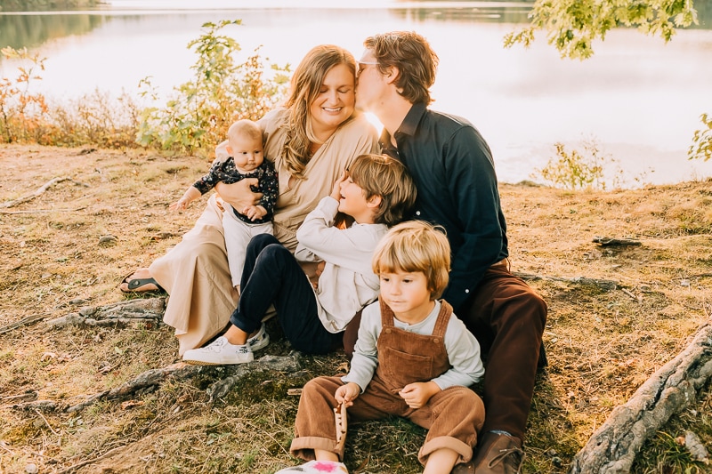 Warm outdoor family portrait at golden hour